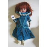 An Armand Marseille bisque shoulder head doll, with blue glass sleeping eyes, open mouth, teeth,