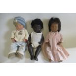 Three Sasha baby dolls, one in its original cardboard tube (Est. plus 21% premium inc. VAT)