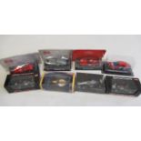 Eight racing car and sports car diecast models including Maserati, Triumph and F1 cars, all items