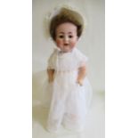 An Alt, Beck & Gottschalck bisque socket head character doll, with brown glass sleeping eyes, open