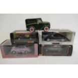 Four large scale diecast vehicles comprising Ford Cosworth, Jaguar XK120, Morris Minor and Citroen