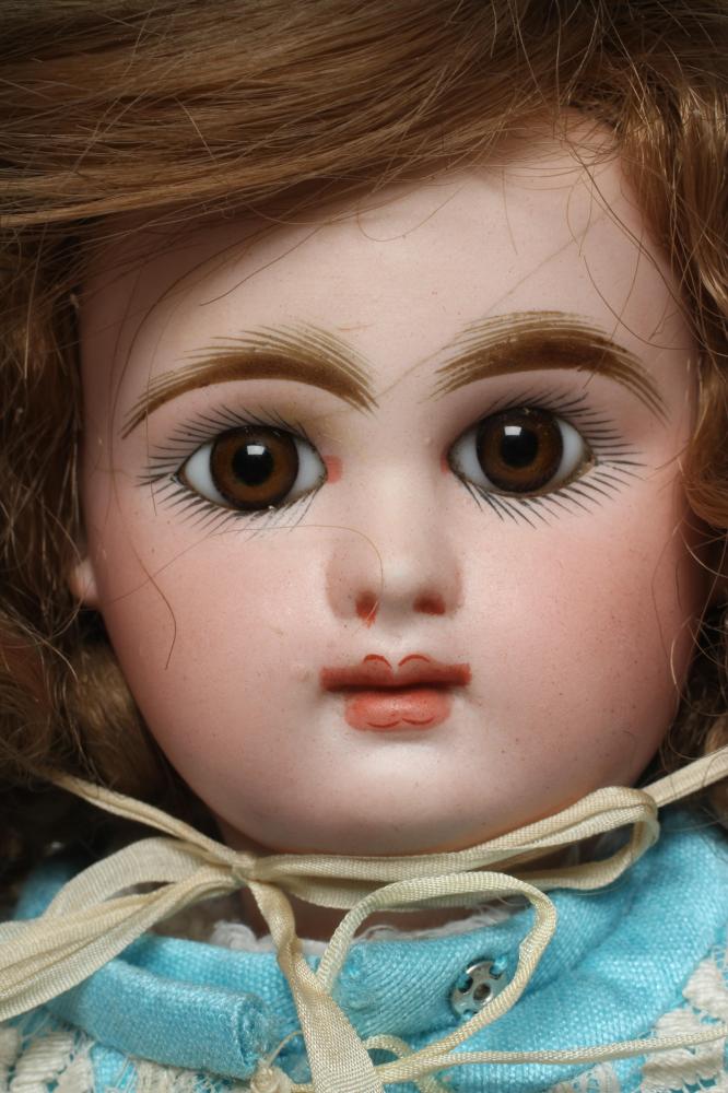 A Mascotte bisque socket head doll, with brown glass fixed eyes, closed mouth, pierced ears, - Image 2 of 3