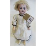 A Simon & Halbig bisque socket head doll, with blue glass sleeping eyes, open mouth, blond wig,