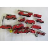 Eleven playworn fire engine models by Corgi, Dinky and others, some items damaged or repainted, F-