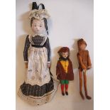 Three dolls comprising a circa 1900 10" wooden maid doll, a 8" felt "Tod Hunter Elf" doll, and a 6