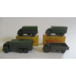 Four Dinky army vehicles comprising three 3-ton wagons and a 10-ton wagon, two items boxed, F-G (