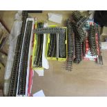 A large quantity of L.G.B. 45mm gauge track including 2M, 1.2 and 1M straights, curved track and
