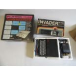 Sinclair ZX8.1 computer, Galaxy Invader hand held computer game and a Plustron TV game box with four