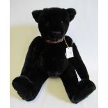 A large "OUT-O-THE WOODS" growling teddy bear, called Big Boy, handmade by Gail, with sewn nose,