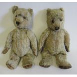 Two pre-war teddy bears, both with swivel joints, sewn noses, amber eyes and light orange plush,