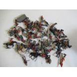 Playworn lead figures including Cowboys and Indians, Scots Guards and others, F-P (Est. plus 21%