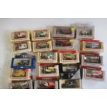 Twenty three Lledo Days Gone diecast vehicles including vans, buses and cars, all items boxed, G-