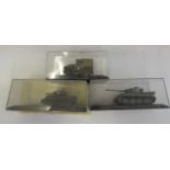 Three diecast army vehicles comprising Sherman tank, Tiger tank and Land Rover, all items boxed,