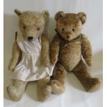 Two vintage straw filled bear hearts, with sewn noses, amber eyes, orange plush and swivel joints,