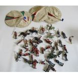 Four Britains army tents and a quantity of lead soldiers, some paint loss and minor damage, F (