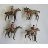 Four Polo players on horseback, solid cast 60mm figures of unknown maker, G (Est. plus 21% premium