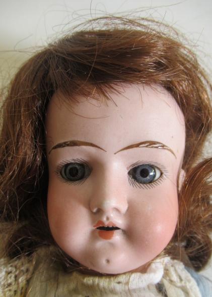 A German bisque socket head doll, with blue glass fixed eyes, open mouth, teeth, moulded eyebrows, - Image 2 of 3