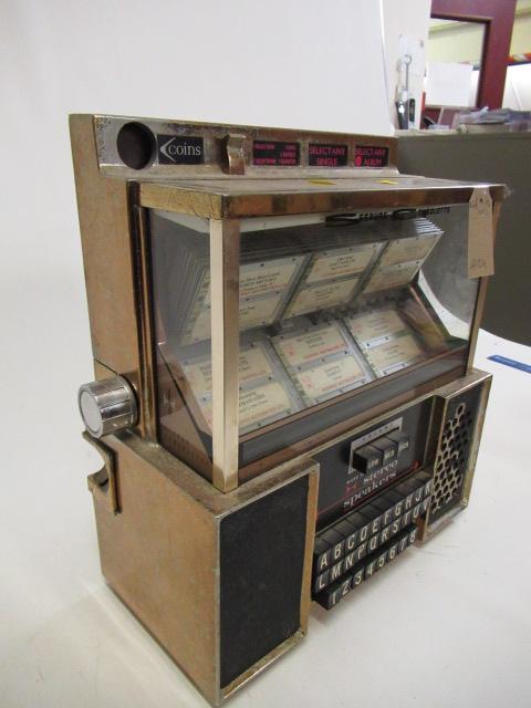 A Seeburg Consolette wall mounted juke box, 1960's, with coin operated system and turn knob song - Image 2 of 2