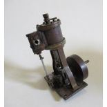 A single cylinder vertical steam engine, non-reversing, 1 3/4" cylinder and solid fly wheel, F (Est.