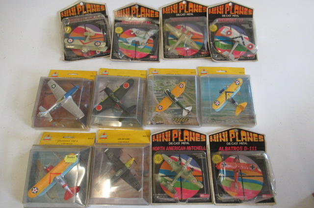 Mini diecast Aircraft by AHM and miniplanes including Mustang, Boeing P-26 and Zero Fighter, all