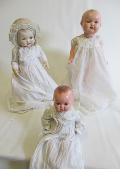 Two Armand Marseille composition head dolls, comprising a 25" socket head numbered 518/7K and a