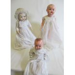 Two Armand Marseille composition head dolls, comprising a 25" socket head numbered 518/7K and a