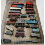 Twenty eight goods wagons by Hornby, Lima, Triang and Bachmann including coal trucks, tankers, car