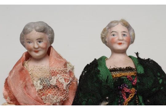 A pair of old lady bisque shoulder head dolls house dolls, with moulded hair, cloth bodies and - Image 2 of 4