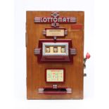 A Lottomat "one armed bandit" slot machine of wooden construction, mounted with decorative metal