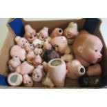 Thirty bisque dolls heads, including AM 351, AM 390, Kammer & Reinhardt etc (Est. plus 21% premium