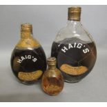 One bottle and one 50cl bottle vintage Dimple Haig's, with clip top stoppers, together with a