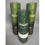 Two bottles Glenfiddich 12 year old signature malt whisky, together with a 35cl bottle, all in tubes