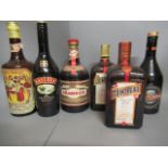 Seven bottles of spirits, comprising two Cointreau, one Baileys, Ballycastle Irish Cream,