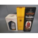 One bottle Glenfiddich special old reserve whisky in Drummond tin, together with a Glenmorangie