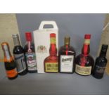 Seven assorted bottles, including 1litre boxed Grand Marnier, 70cl Grand Marnier, Cointreau and