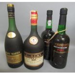 Four mixed bottles of alcohol, comprising two Cockburn's Special Reserve port, one Remy Martin