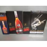 Five bottles Remy Martin VSOP fine champagne cognac, together with a Martell fine cognac, all