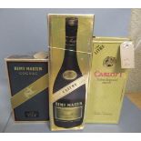 One litre Remy Martin fine champagne cognac, together with one 50cl bottle of Remy Martin and a