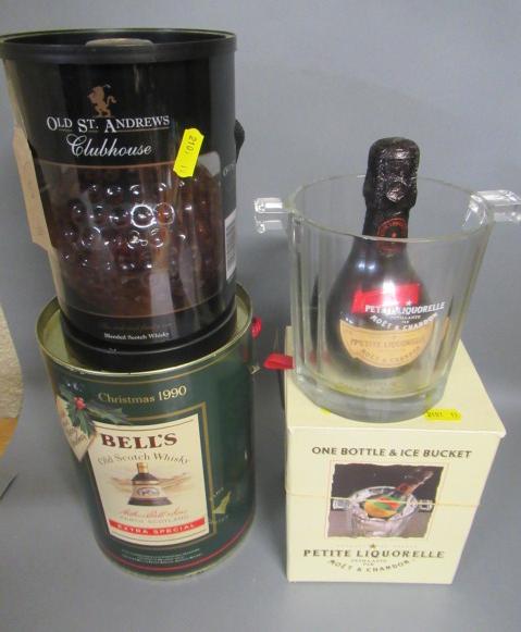 Two bottles of blended whisky comprising one Old St. Andrews Clubhouse and a Bells Whisky decanter