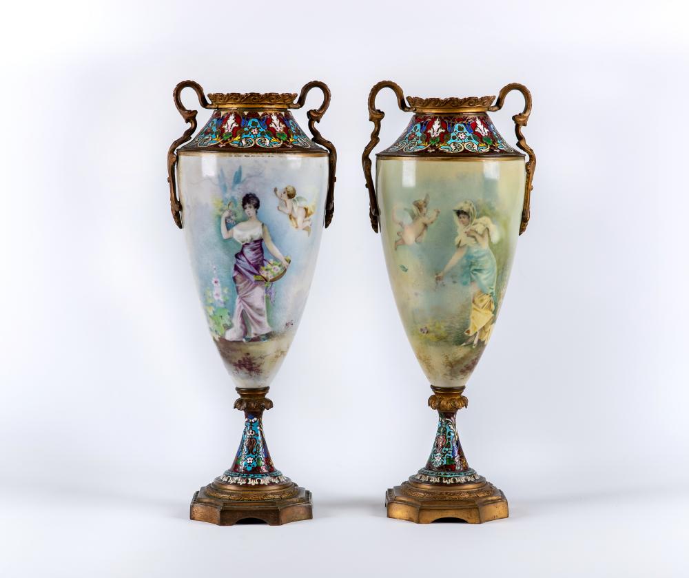 A PAIR OF SEVRES STYLE PORCELAIN GARNITURE URNS, c.1900, of slender ovoid form each sparsely printed