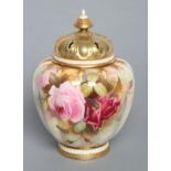 A ROYAL WORCESTER CHINA POT POURRI VASE AND COVERS, 1912, of melon fluted form painted in polychrome