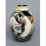 A MOORCROFT POTTERY TORRIDON PATTERN VASE, 2004, of ovoid form with waisted neck, designed by Philip