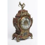 A FRENCH RED BOULLE AND GILT METAL TABLE CLOCK, late 19th century, the twin barrel movement with