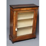 A VICTORIAN WALNUT AND EBONISED PIER DISPLAY CABINET with foliate marquetry and gilt metal mounts,