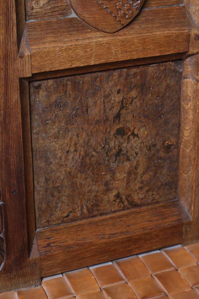 A PAIR OF ROBERT THOMPSON CARVED OAK HALL CHAIRS, the twin panel back bearing the Horlick crest - Image 3 of 5