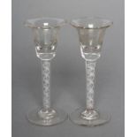 A PAIR OF WINE GLASSES, the bell bowls engraved with fruiting vines on double series opaque white