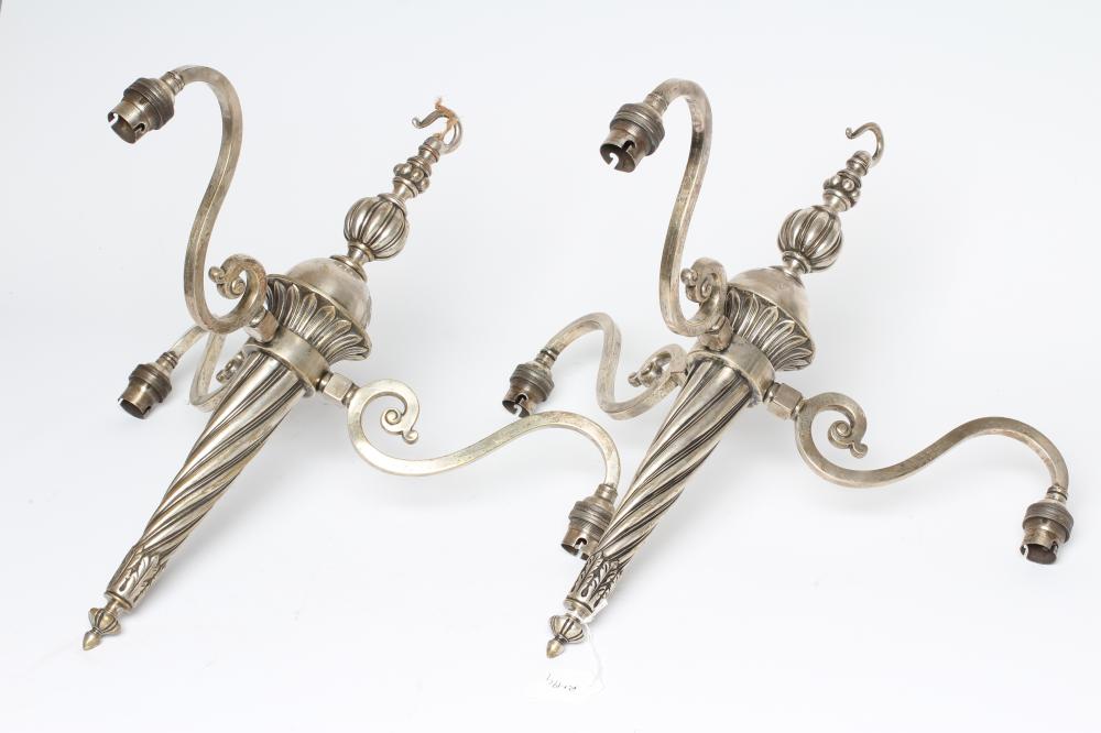 A PAIR OF EDWARDIAN SILVER PLATED LIGHT PENDANTS, the three scrolled branches issuing from a wrythen