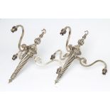 A PAIR OF EDWARDIAN SILVER PLATED LIGHT PENDANTS, the three scrolled branches issuing from a wrythen