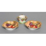A PAIR OF ROYAL WORCESTER CHINA DISHES, 1933, of scrolling quatrefoil form, both painted in
