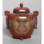 A JAPANESE CLOISONNE ENAMEL VASE AND COVER of lobed oval section, with two applied stylised handles,